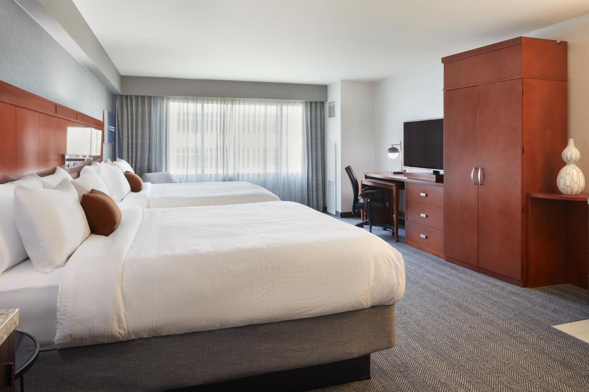 Room Two King Beds Bathtub Mobility Access