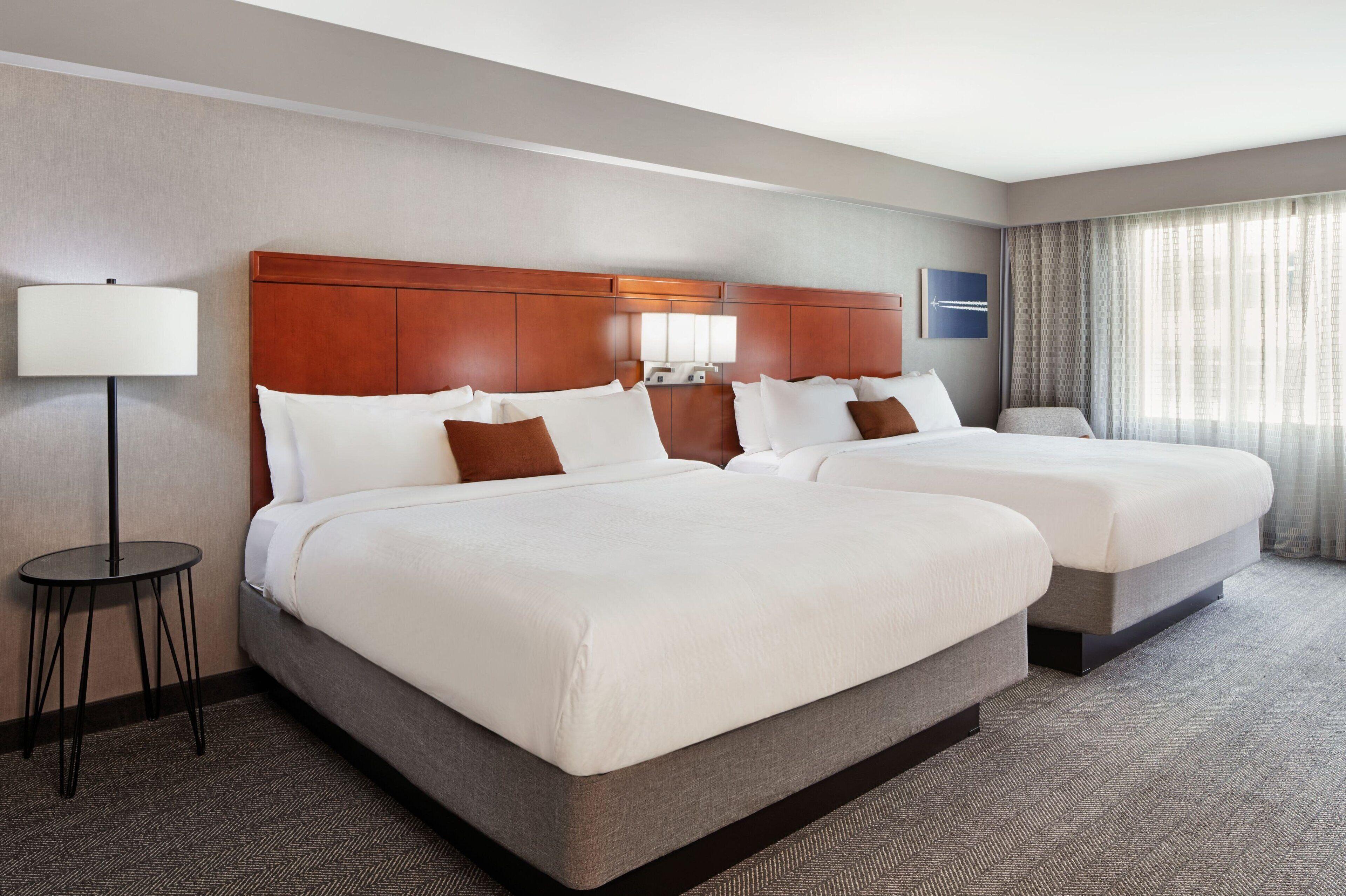 Room Two King Beds Bathtub Mobility Access
