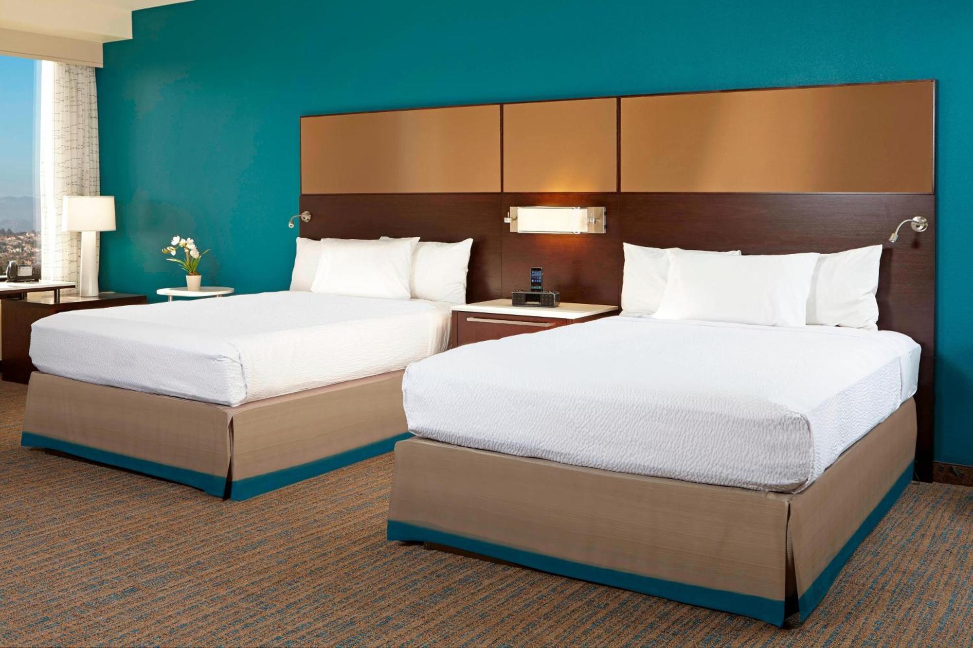 Larger Queen Studio Two Queen Beds